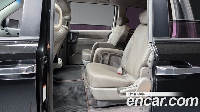 Kia Canival 2013 — photo 12