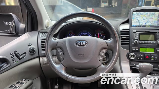Kia Canival 2013 — photo 14