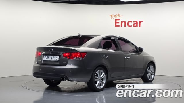 Kia Porte 2012 — photo 2
