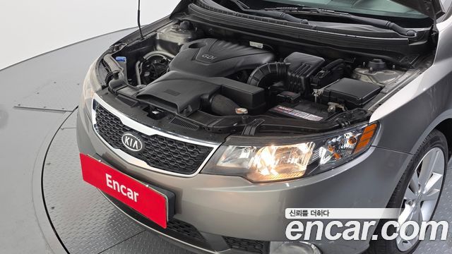 Kia Porte 2012 — photo 6
