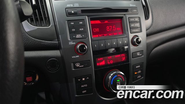 Kia Porte 2012 — photo 11