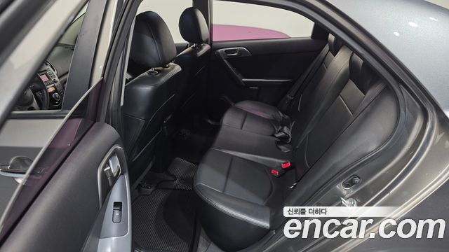 Kia Porte 2012 — photo 12