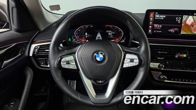 BMW 5-Series 2023 — photo 13