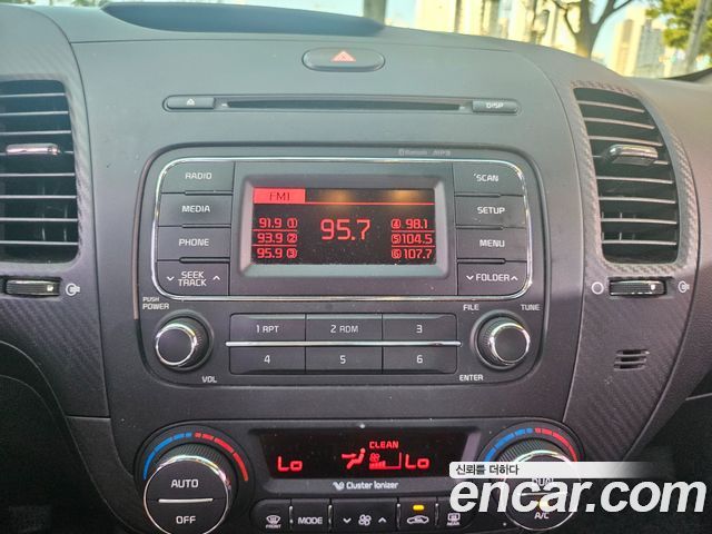 Kia K3 2015 — photo 14