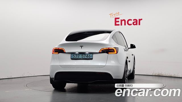 Tesla Model Y 2023 — photo 4