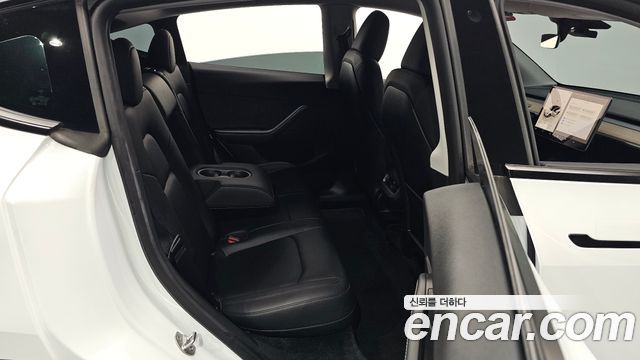 Tesla Model Y 2023 — photo 18