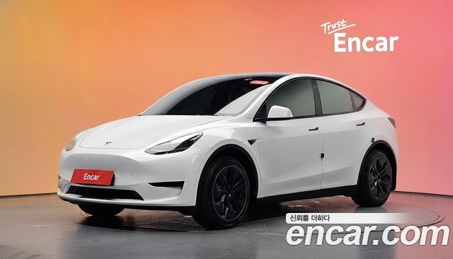 Tesla Model Y 2023 — photo 1