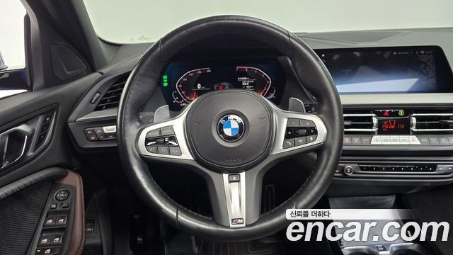 BMW 1-Series 2023 — photo 13