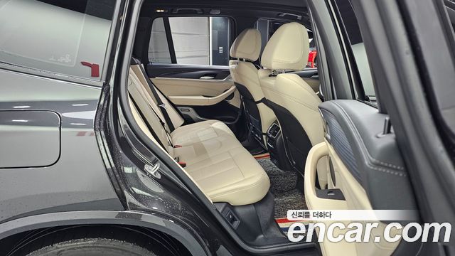 BMW iX3 2023 — photo 18