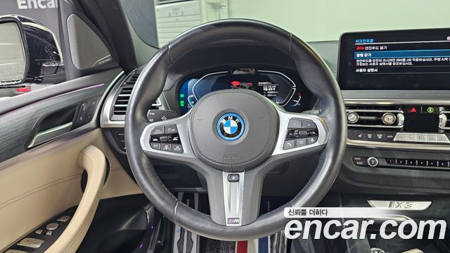 BMW iX3 2023 — photo 19