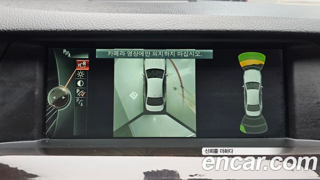 BMW 5-Series 2013 — photo 14