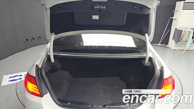 BMW 5-Series 2013 — photo 20