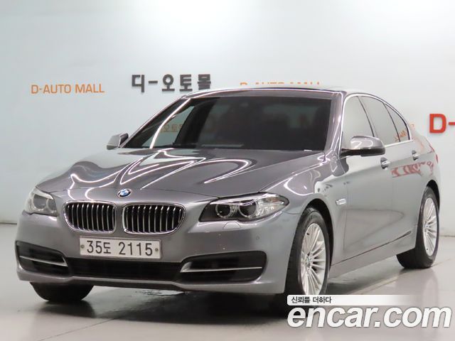 BMW 5-Series 2014 — photo 1