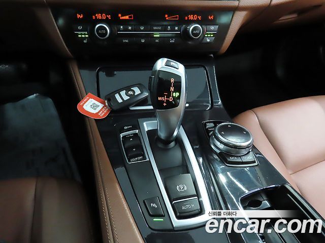 BMW 5-Series 2014 — photo 14