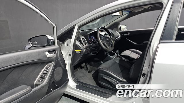 Kia K3 2015 — photo 10