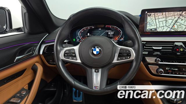 BMW 5-Series 2023 — photo 12