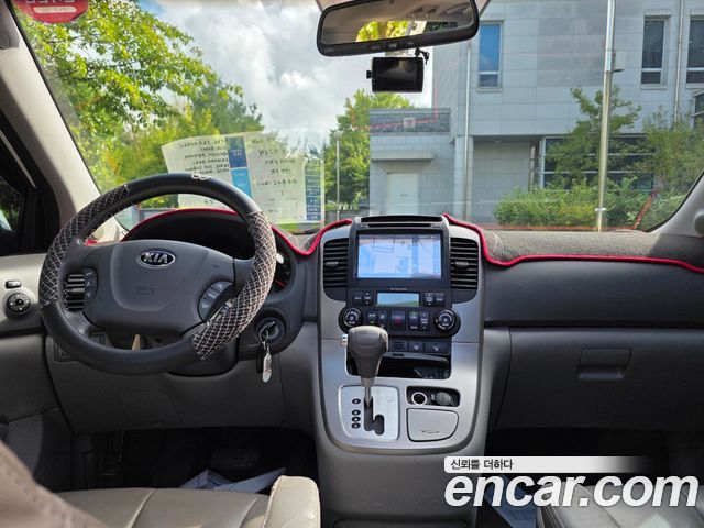 Kia Canival 2013 — photo 9