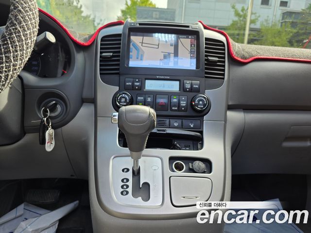 Kia Canival 2013 — photo 10