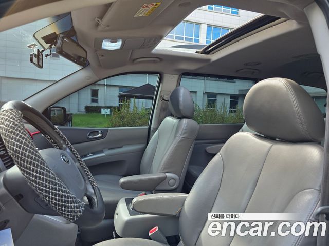 Kia Canival 2013 — photo 11