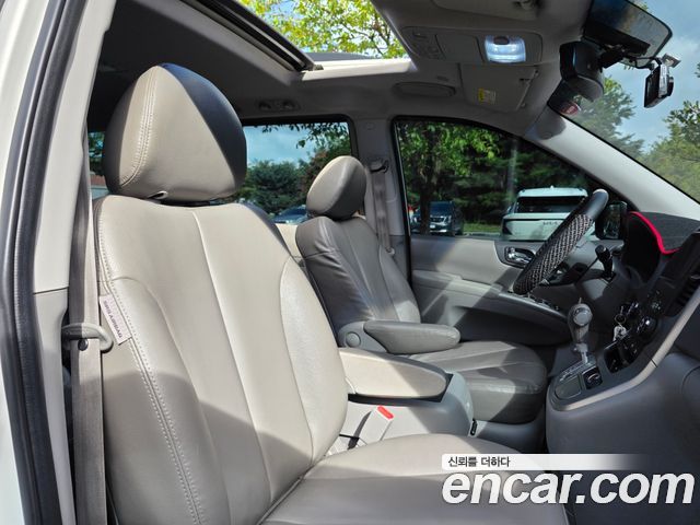 Kia Canival 2013 — photo 12