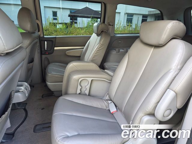 Kia Canival 2013 — photo 13