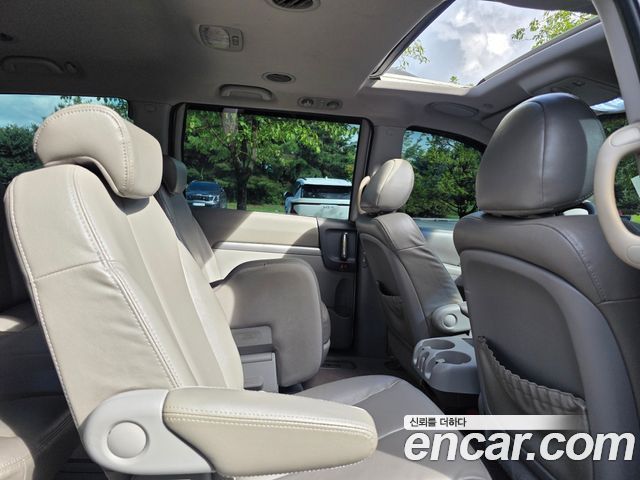 Kia Canival 2013 — photo 14