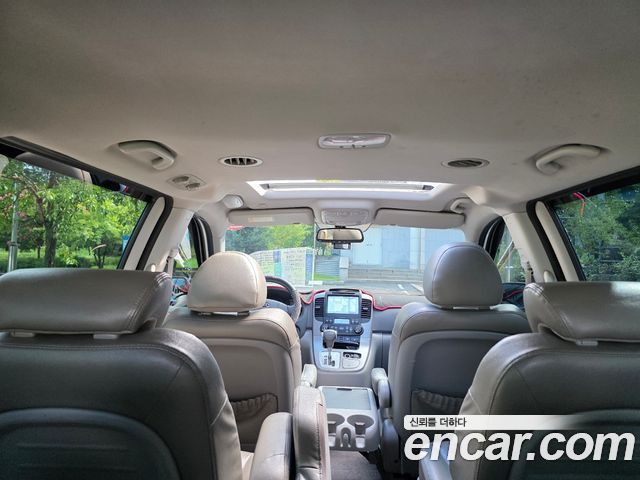 Kia Canival 2013 — photo 15