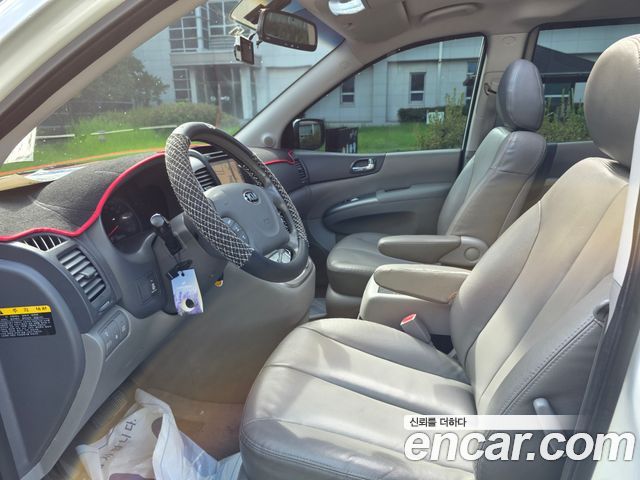 Kia Canival 2013 — photo 16