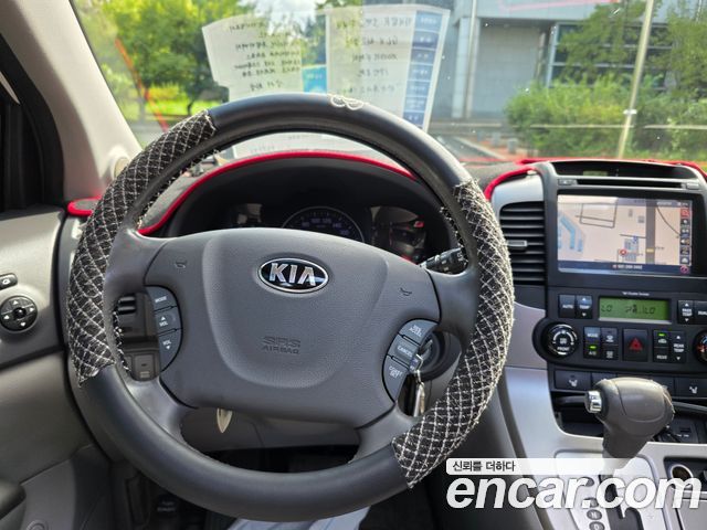 Kia Canival 2013 — photo 17