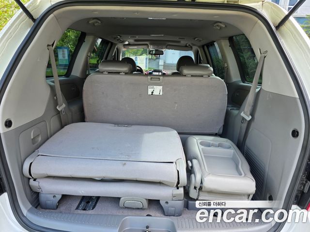 Kia Canival 2013 — photo 20