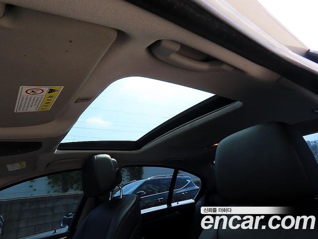 BMW 5-Series 2013 — photo 18
