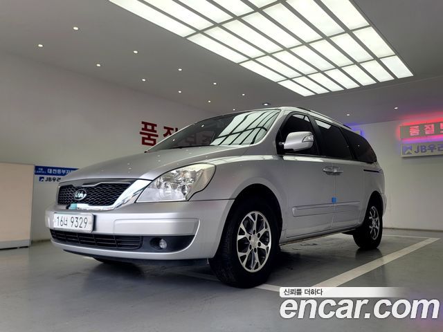 Kia Canival 2012 — photo 2