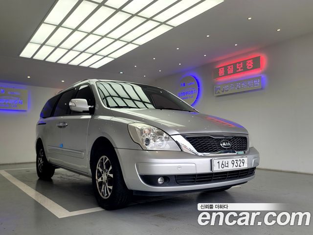 Kia Canival 2012 — photo 3