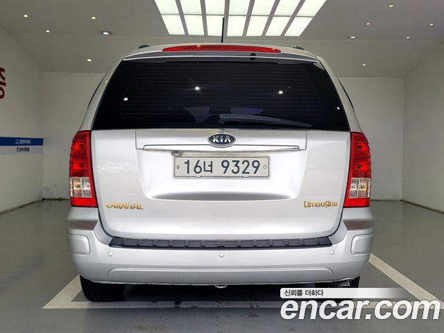 Kia Canival 2012 — photo 4