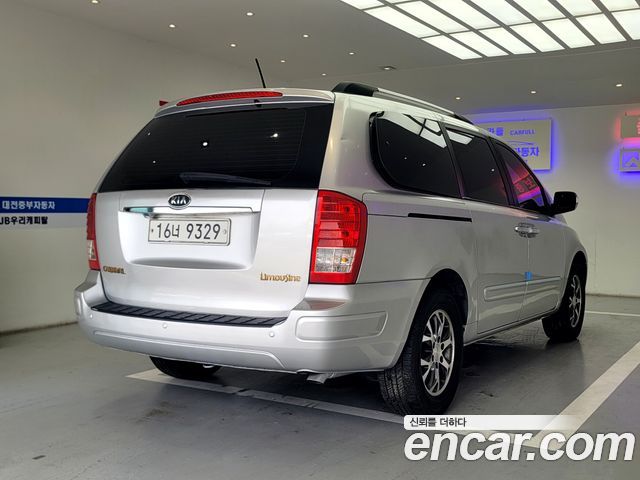 Kia Canival 2012 — photo 5