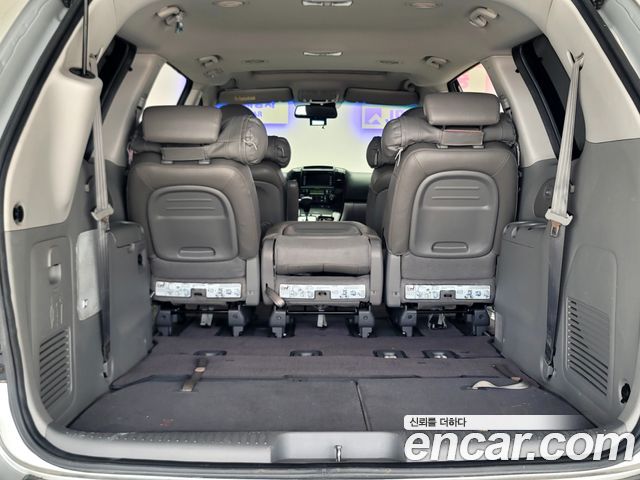 Kia Canival 2012 — photo 11
