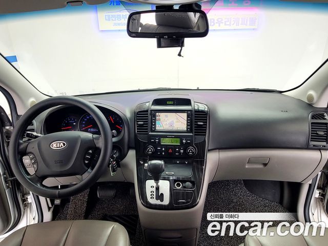 Kia Canival 2012 — photo 13