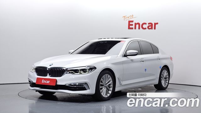 BMW 5-Series 2018 — photo 1