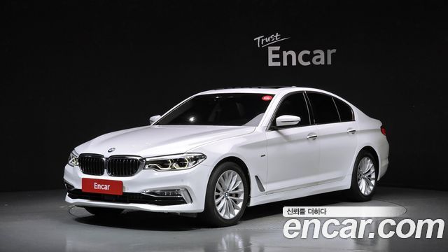 BMW 5-Series 2018 — photo 1