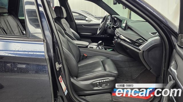 BMW X5 2014 — photo 11