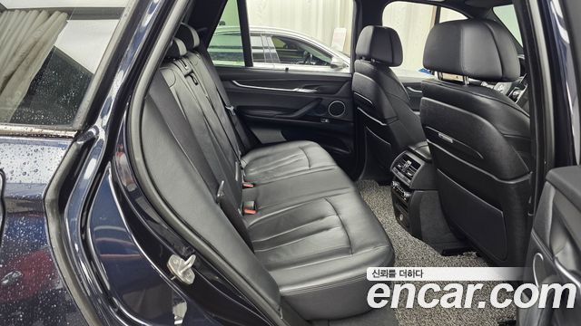 BMW X5 2014 — photo 12