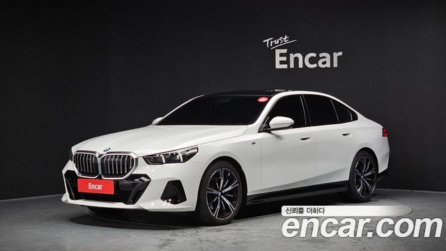 BMW 5-Series 2024 — photo 1