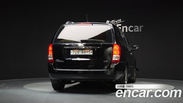 Kia Canival 2013 — photo 4
