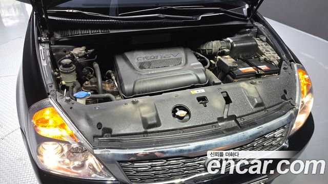 Kia Canival 2013 — photo 6