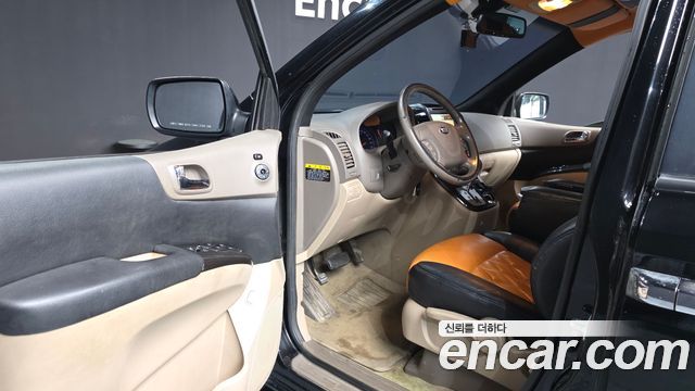 Kia Canival 2013 — photo 10