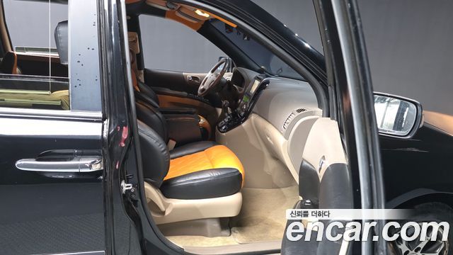 Kia Canival 2013 — photo 11