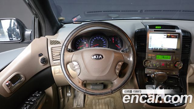 Kia Canival 2013 — photo 13