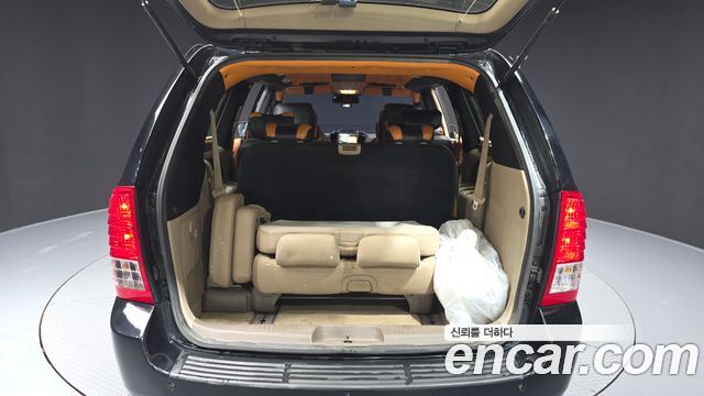 Kia Canival 2013 — photo 20