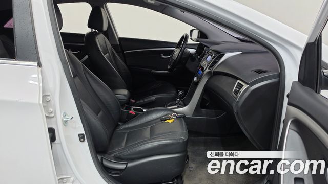 Hyundai i30 2014 — photo 11