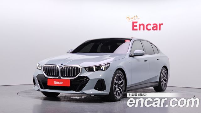 BMW 5-Series 2024 — photo 1